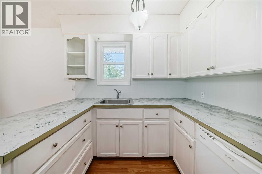 Single Family House Bungalow for Sale in   Street SE Forest Lawn Calgary 