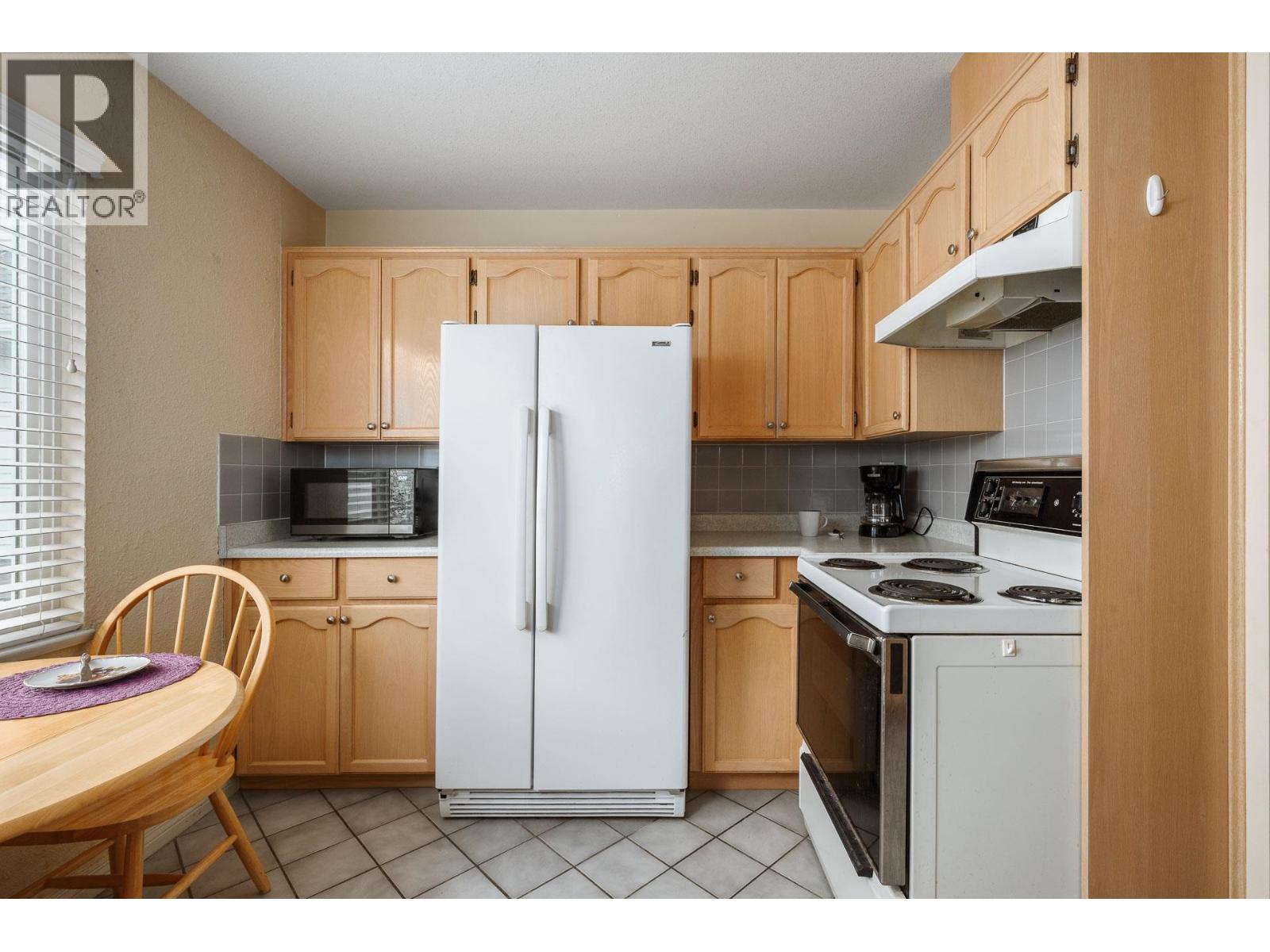 #205-4988 47A Avenue, Delta