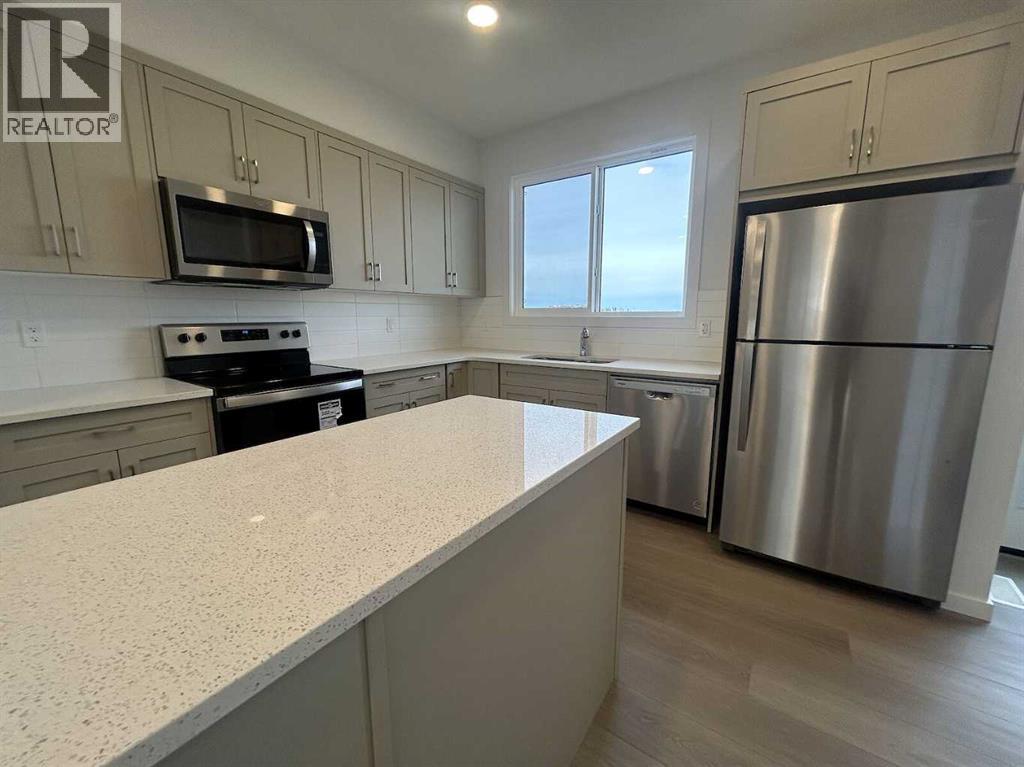 Single Family House for Sale in  Belmont Way SW Belmont Calgary 