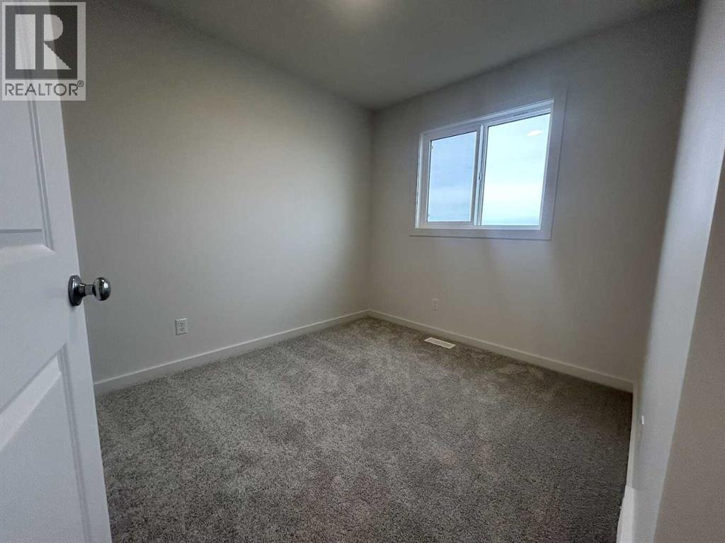 Single Family House for Sale in  Belmont Way SW Belmont Calgary 