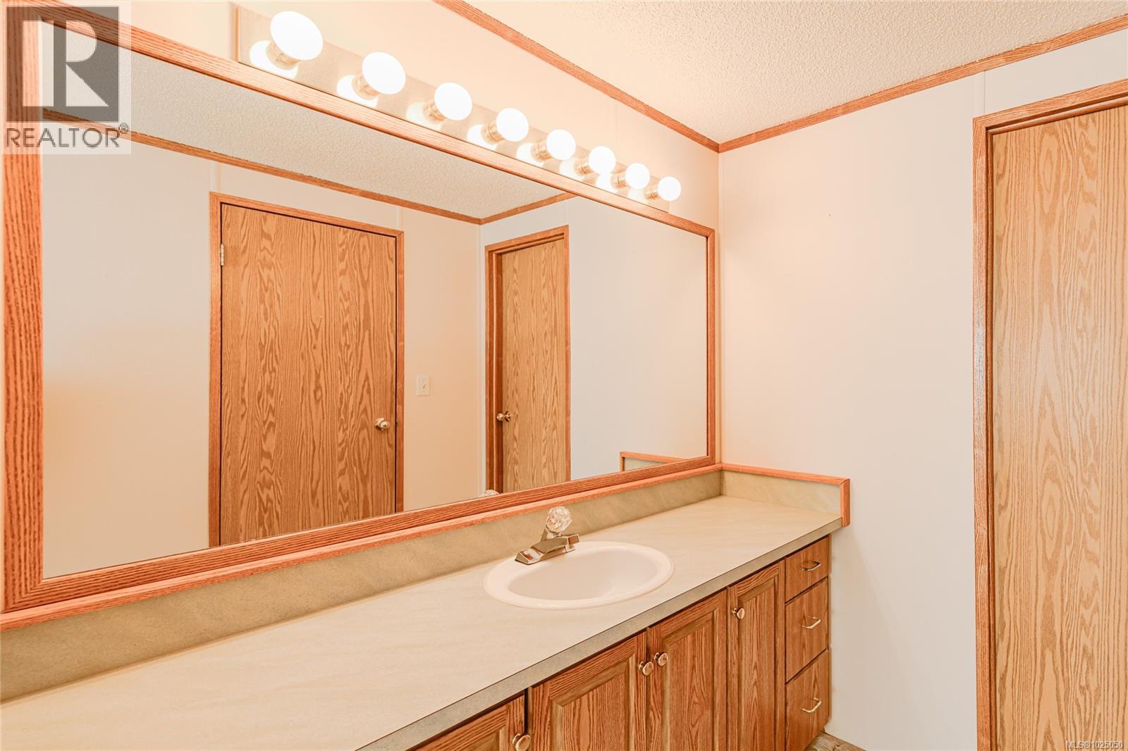 #1 7109 WEST COAST RD - 22