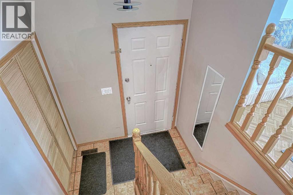 Single Family House Bi-level for Sale in  Shawmeadows Road SW Shawnessy Calgary 