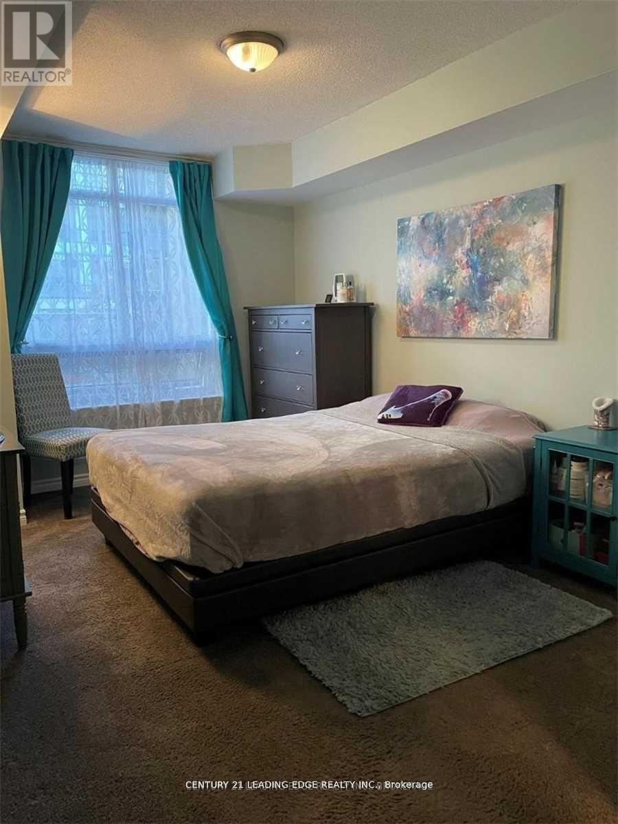 #212 18 KENASTON GARDENS - 18