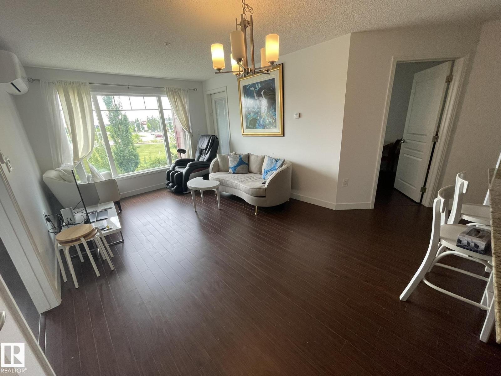 #207 7021 SOUTH TERWILLEGAR DR NW - 7
