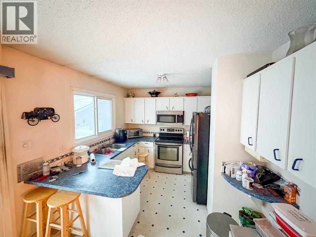 Single Family House Bi-level for Sale in  A Avenue Mountview Grande Prairie 