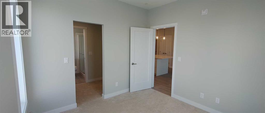 #403 660 SHAWNEE SQUARE SW - 8
