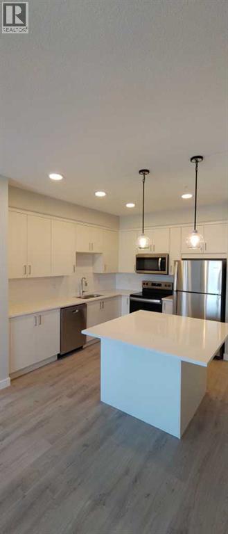 #403 660 SHAWNEE SQUARE SW - 2