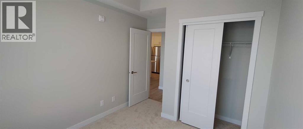 #403 660 SHAWNEE SQUARE SW - 18