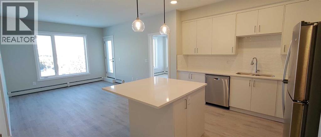 #403 660 SHAWNEE SQUARE SW - 1