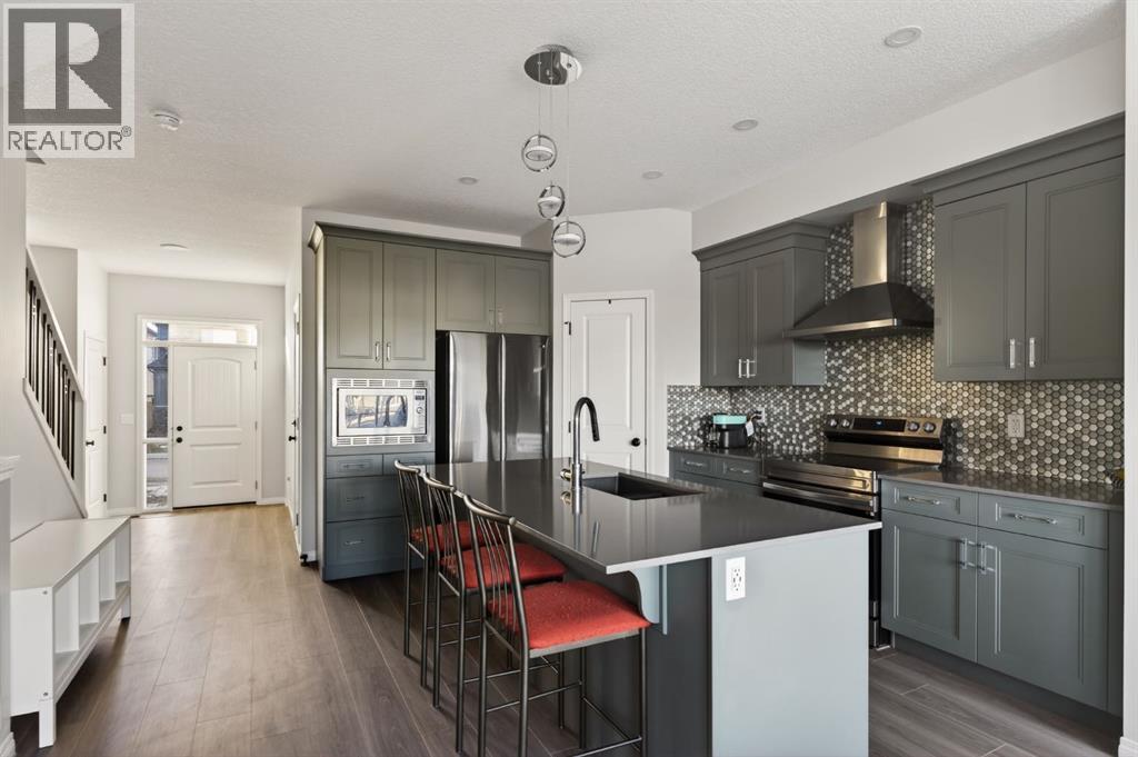 Single Family House for Sale in  Belmont Heath SW Belmont Calgary 