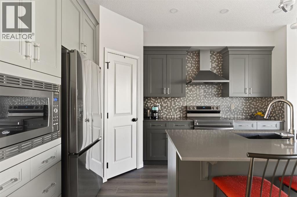 Single Family House for Sale in  Belmont Heath SW Belmont Calgary 