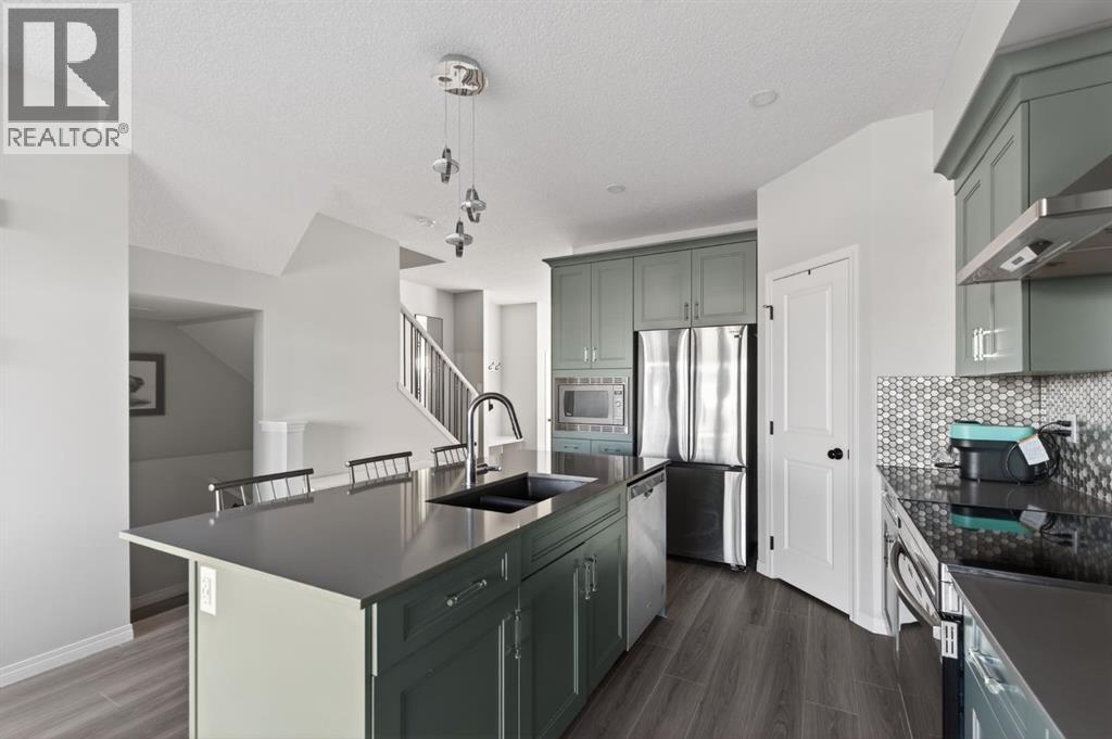 Single Family House for Sale in  Belmont Heath SW Belmont Calgary 