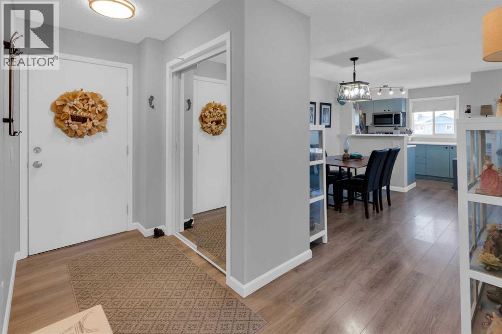 8401, 304 MacKenzie Way SW - Photo 4 of 29, Airdrie, Alberta