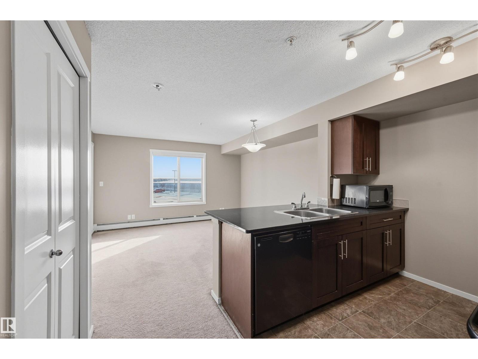 #208 5810 MULLEN PL NW - 4