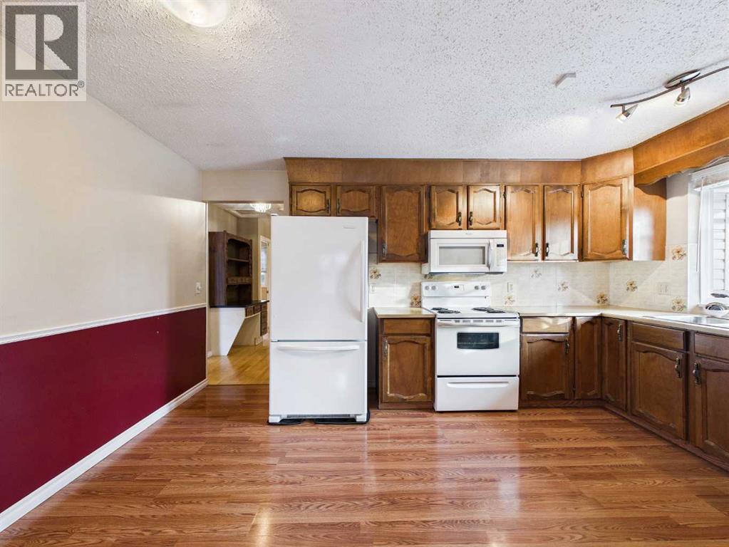 Single Family House Bungalow for Sale in  Dalcastle Mews NW Dalhousie Calgary 