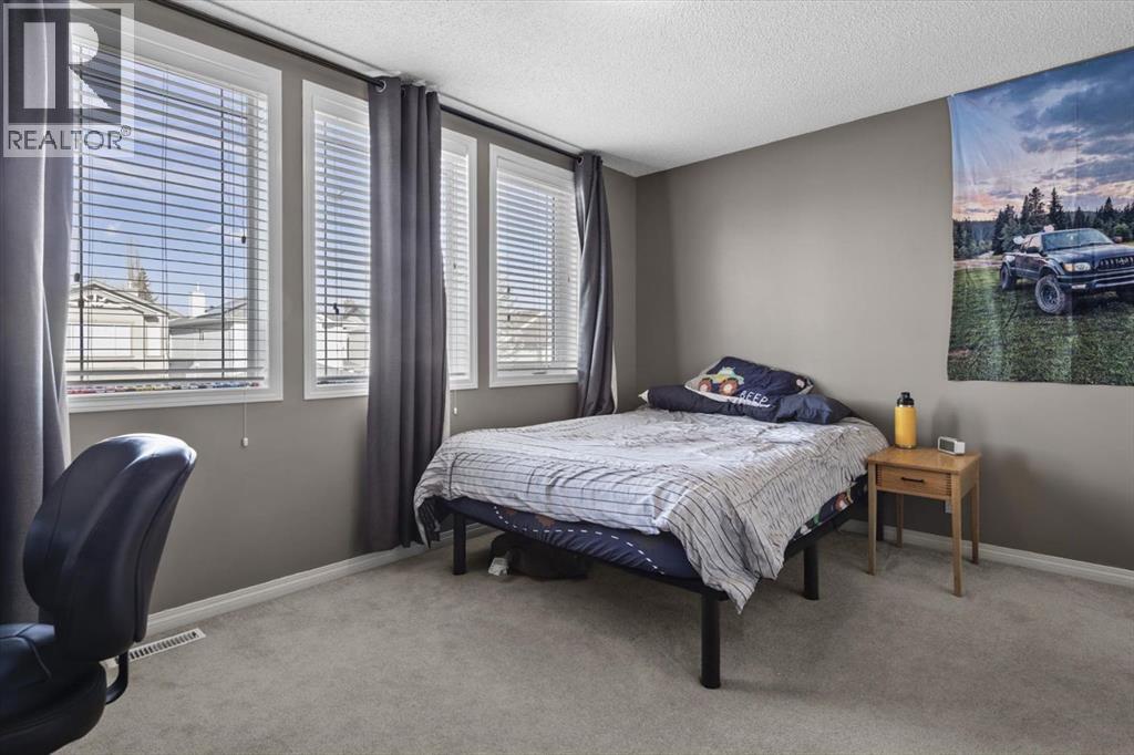 Single Family House for Sale in  Tuscany Ravine Close NW Tuscany Calgary 