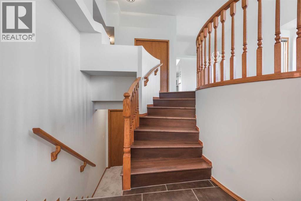 Single Family House Bi-level for Sale in  Arbour Ridge Heights NW Arbour Lake Calgary 