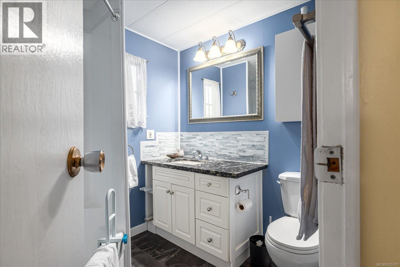 #7 1247 ARBUTUS RD - 16