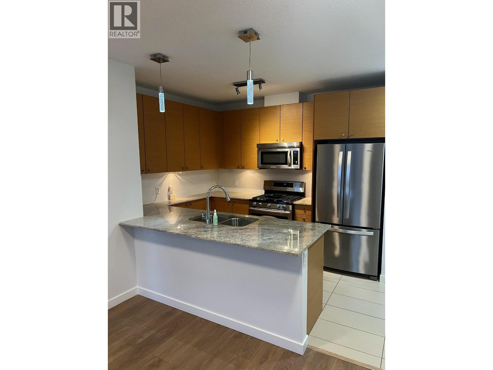 302 7362 ELMBRIDGE Way - photo 2
