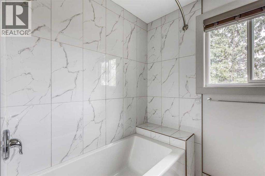 Single Family House Bungalow for Sale in  Cantrell Drive SW Canyon Meadows Calgary 