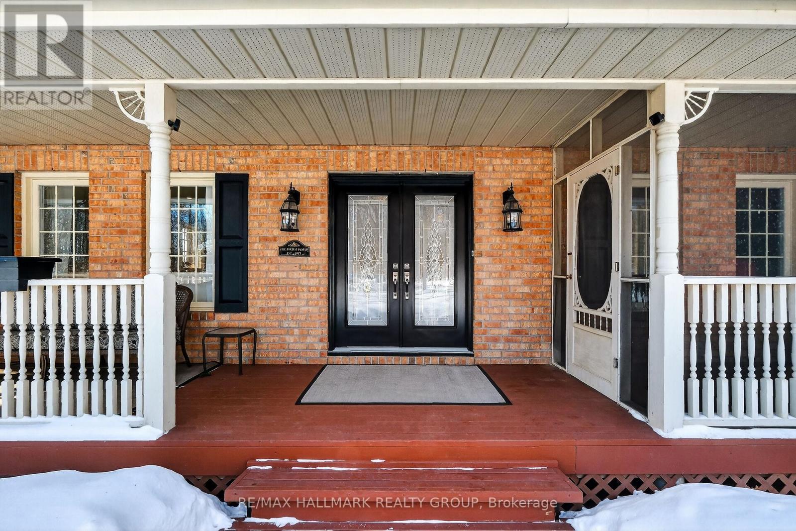 Wrap-around front porch with screened in section