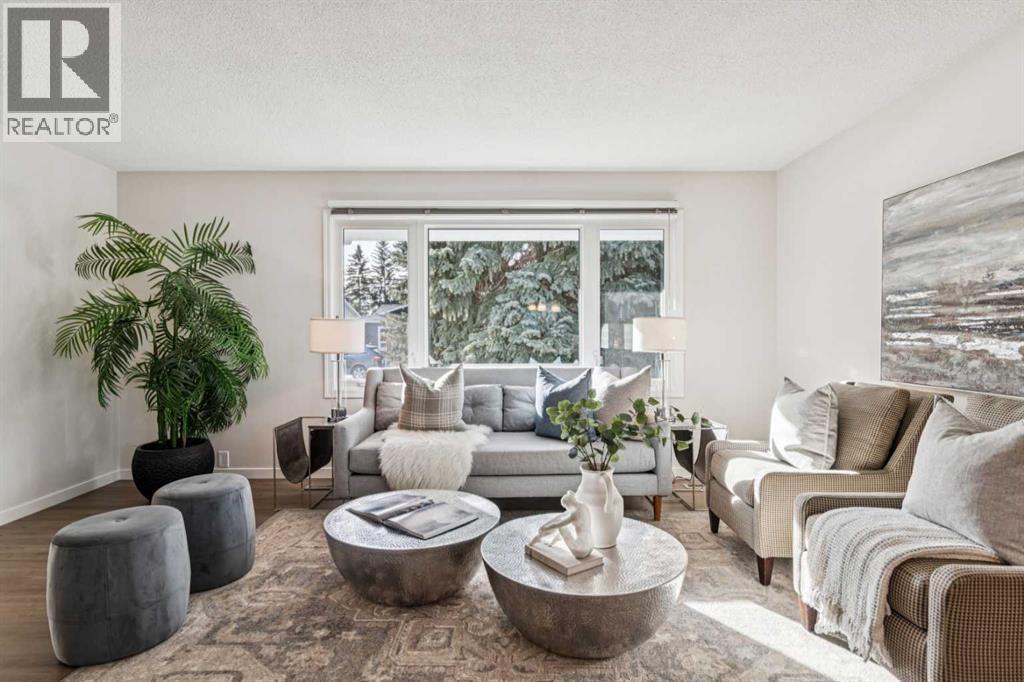 Single Family House 4 Level for Sale in  Lake Adams Crescent SE Lake Bonavista Calgary 