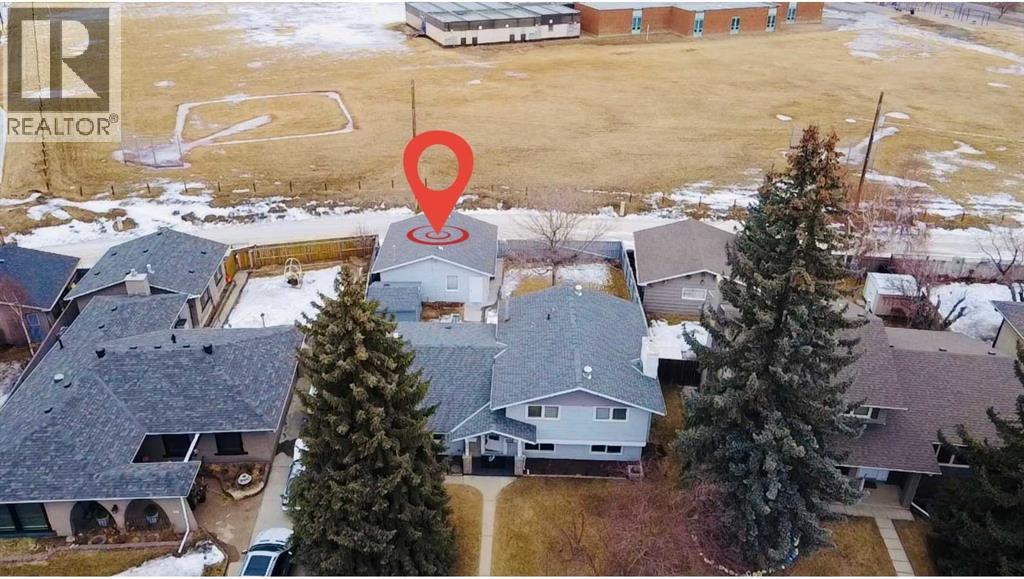 Single Family House 4 Level for Sale in  Lake Adams Crescent SE Lake Bonavista Calgary 