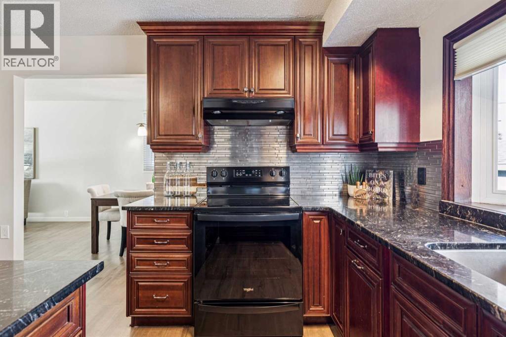 Single Family House 4 Level for Sale in  Lake Adams Crescent SE Lake Bonavista Calgary 