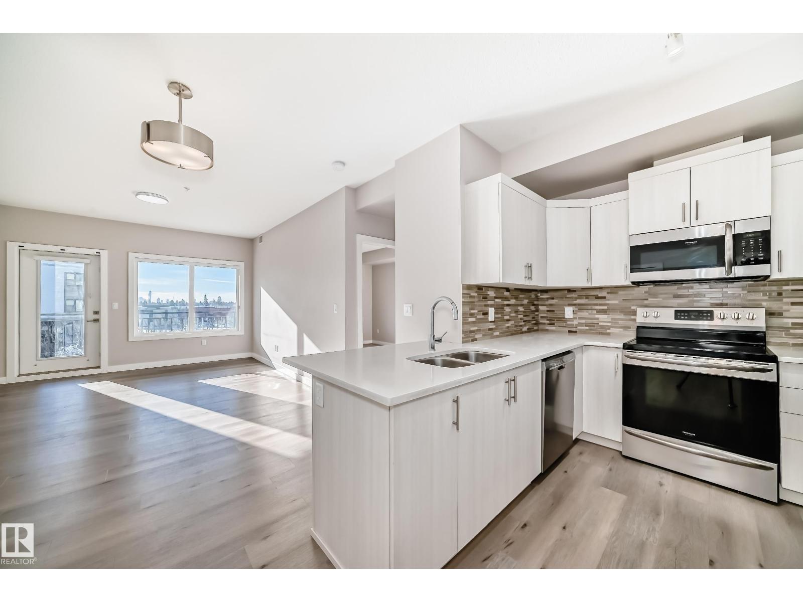 322 560 GRIESBACH PARADE PR NW - Photo 29