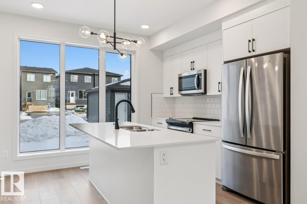 
          7460 KLAPSTEIN CR SW
            <br/>
            <span>Edmonton</span>
            , 
            <span>AB</span>
             <span>T6W5N5</span>
         - Photo 13