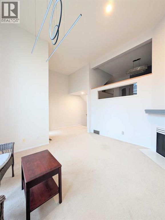 Single Family House 4 Level for Sale in  Hawkstone Manor NW Hawkwood Calgary 