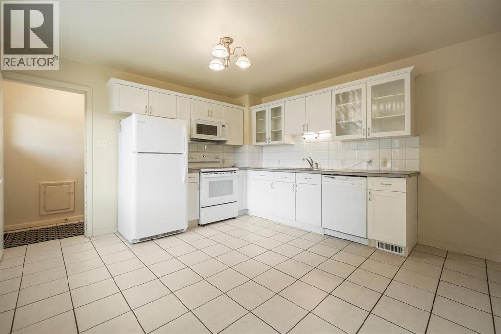 Single Family House Bungalow for Sale in  Russet Road NE Renfrew Calgary 