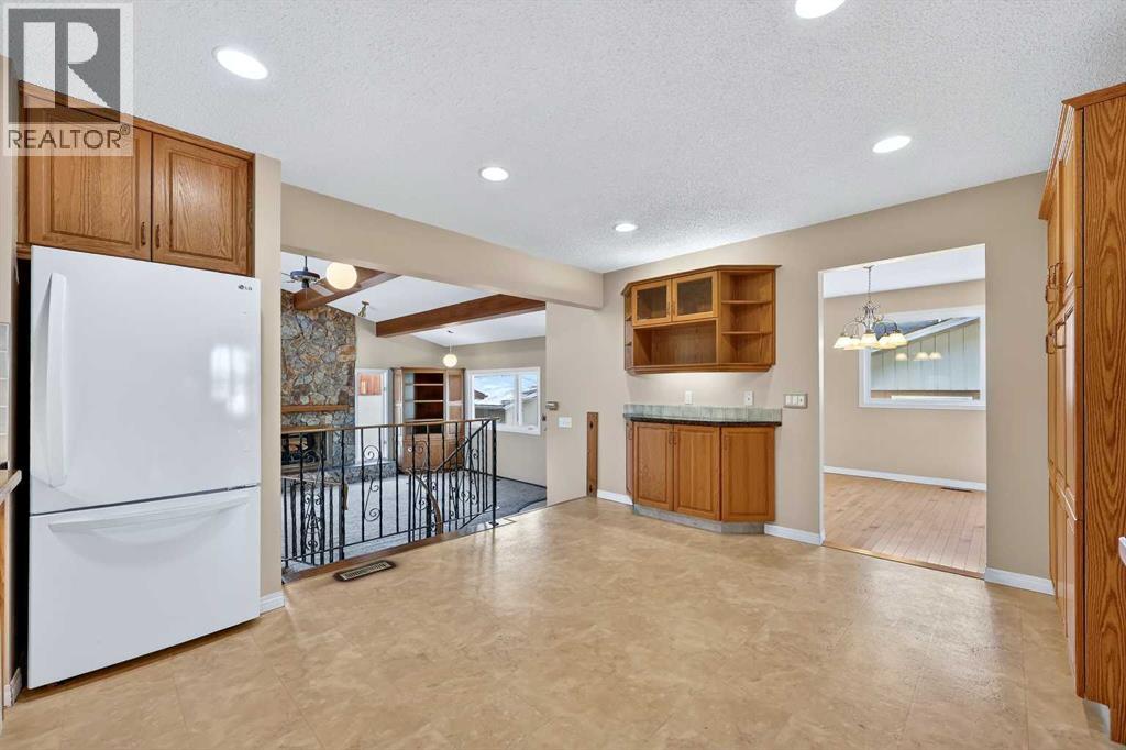 Single Family House Bi-level for Sale in  Valiant Drive NW Varsity Calgary 