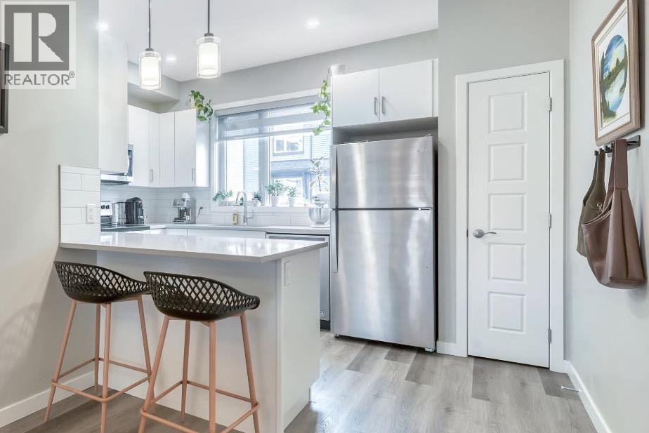 Single Family House for Sale in   Belmont Drive SW Belmont Calgary 