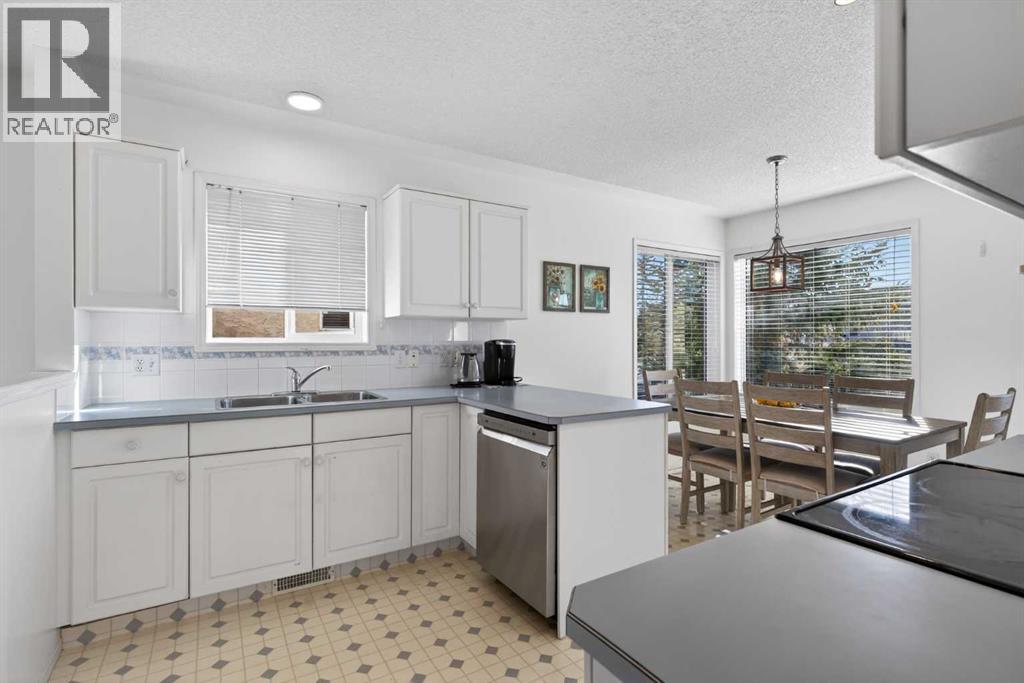 Single Family House Bungalow for Sale in  Sierra Morena Green SW Signal Hill Calgary 