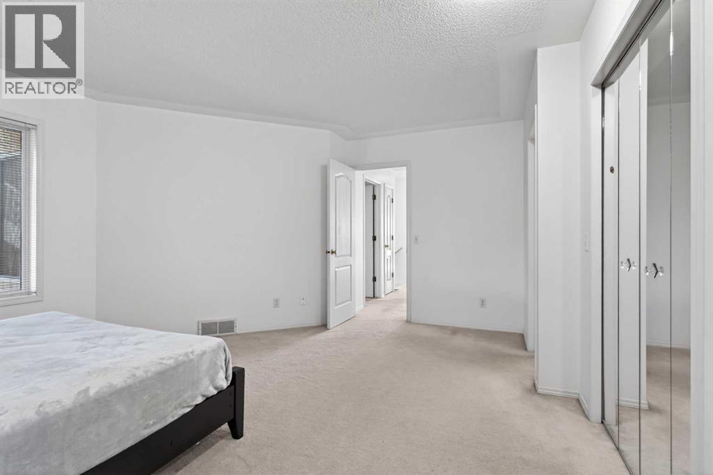 Single Family House Bungalow for Sale in  Sierra Morena Green SW Signal Hill Calgary 