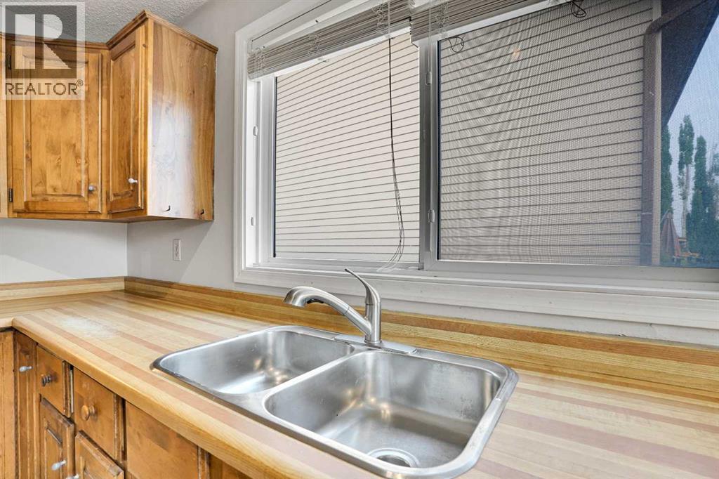 Single Family House Bungalow for Sale in  Ranchview Drive NW Ranchlands Calgary 