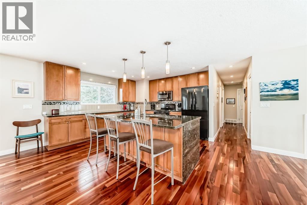 Single Family House Bi-level for Sale in  Varbow Place NW Varsity Calgary 