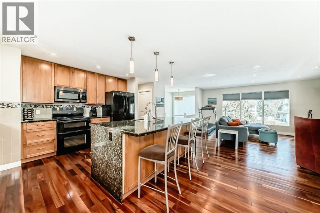 Single Family House Bi-level for Sale in  Varbow Place NW Varsity Calgary 