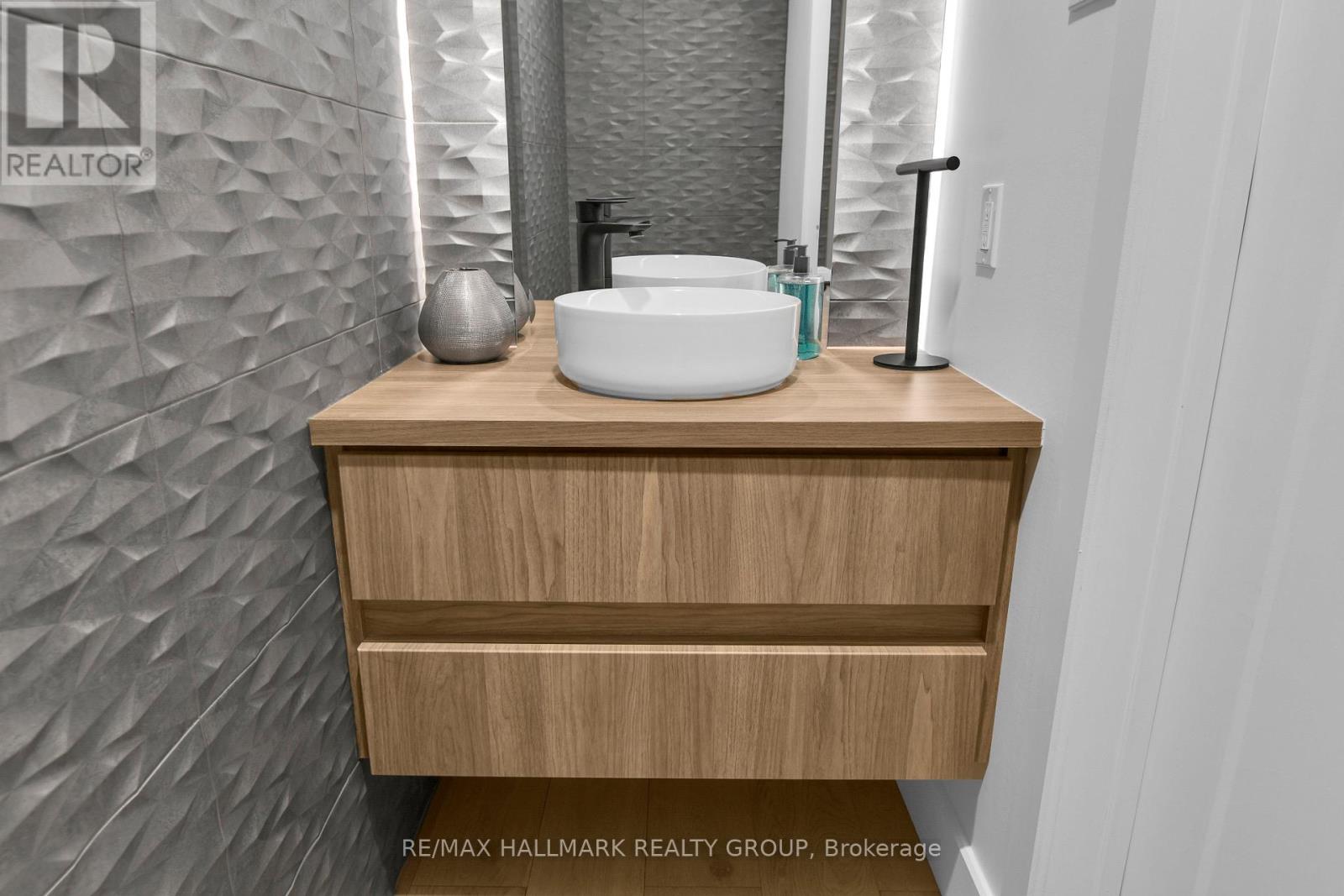 Main Level - Powder Room with wave tile