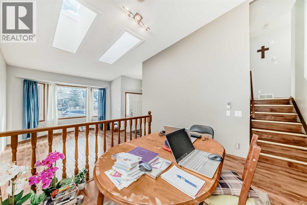 Single Family House 4 Level for Sale in  Hawkwood Boulevard NW Hawkwood Calgary 