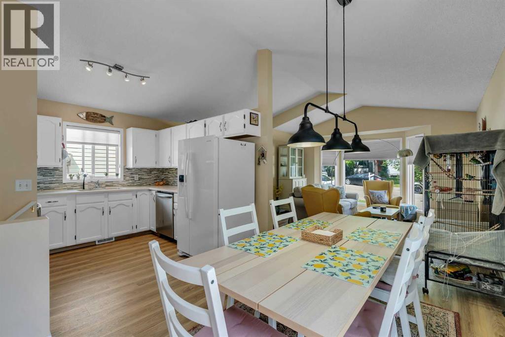 Single Family House 4 Level for Sale in  Covington Rise NE Coventry Hills Calgary 