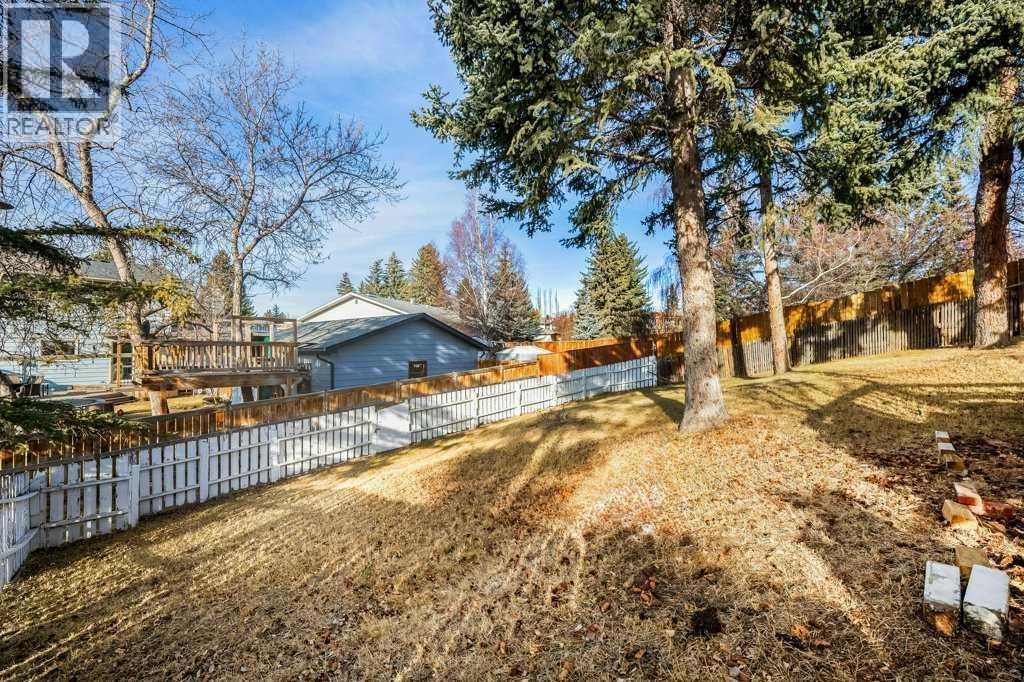 Single Family House 4 Level for Sale in  Dalcastle Crescent NW Dalhousie Calgary 