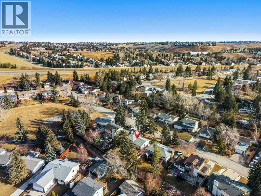 Single Family House 4 Level for Sale in  Dalcastle Crescent NW Dalhousie Calgary 