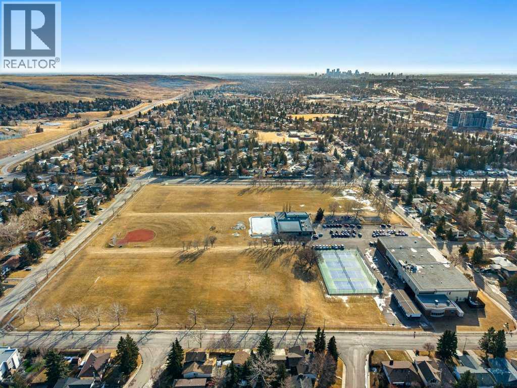 Single Family House 4 Level for Sale in  Dalcastle Crescent NW Dalhousie Calgary 