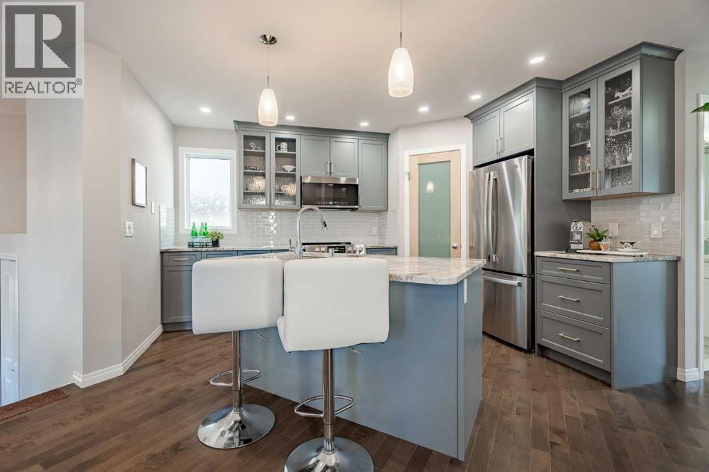 Single Family House Bi-level for Sale in  Covebrook Close NE Coventry Hills Calgary 