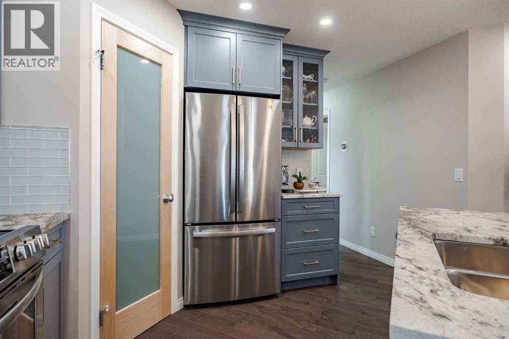 Single Family House Bi-level for Sale in  Covebrook Close NE Coventry Hills Calgary 