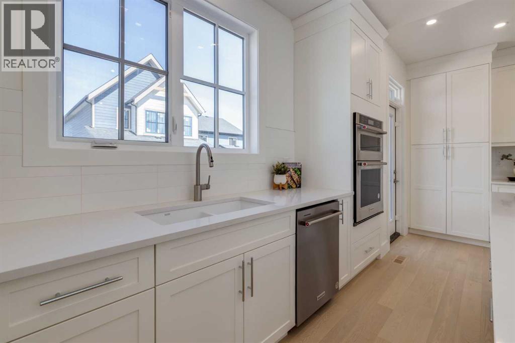 Single Family House Bungalow for Sale in  Treeline Gardens SW Alpine Park Calgary 