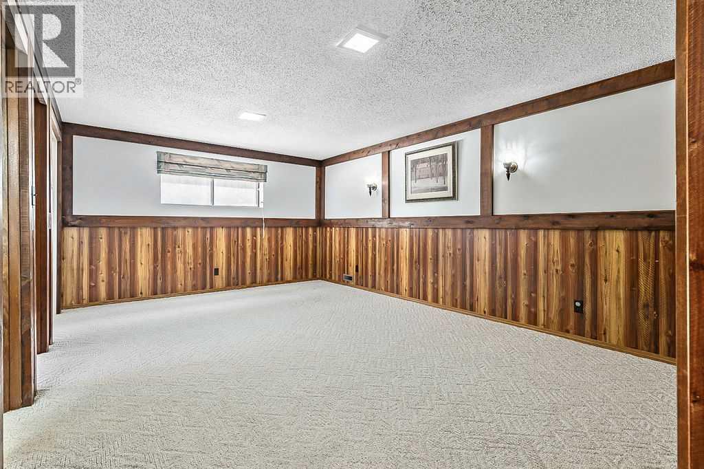 Single Family House Bungalow for Sale in  Lock Crescent Rosemont Okotoks 