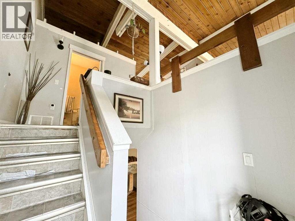 Single Family House Bi-level for Sale in A  Braxton Place SW Braeside Calgary 